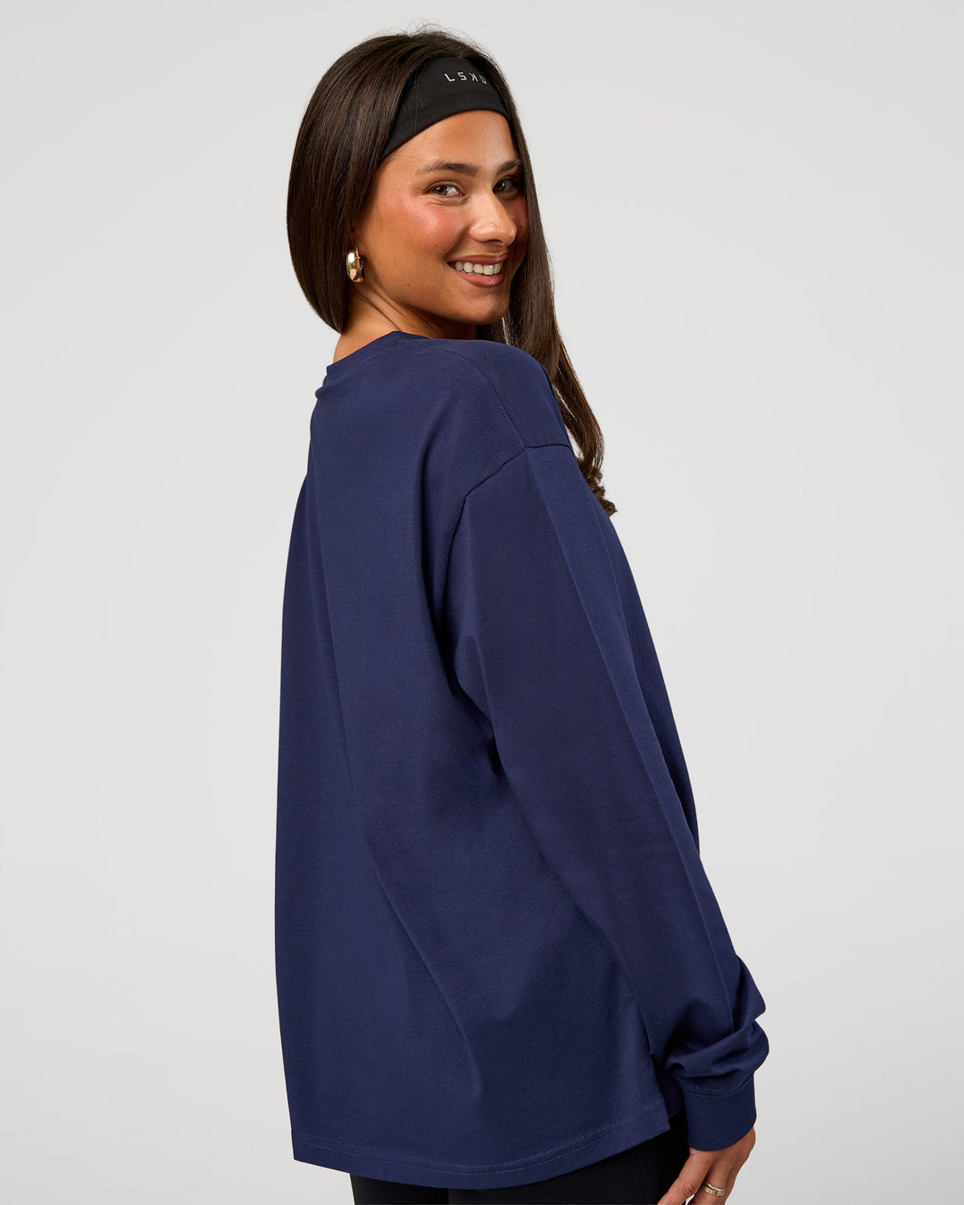 Woman wearing Go-To Long Sleeve FLXCotton Oversized Tee - Future Navy-White | Model:Bianca | Size:S