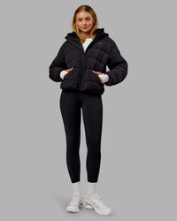 Woman wearing Go-To Puffer Jacket - Black | Model:Ella | Size:S