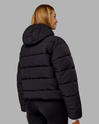 Woman wearing Go-To Puffer Jacket - Black | Model:Ella | Size:S