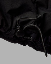 Woman wearing Go-To Puffer Vest - Black | Model:Ella | Size:S