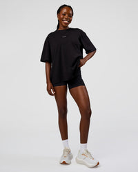 Woman wearing Go-To Run Club FLXCotton Oversized Tee - Black-Marshmallow | Model:Ellie | Size:S | Thumbnail Index: 4