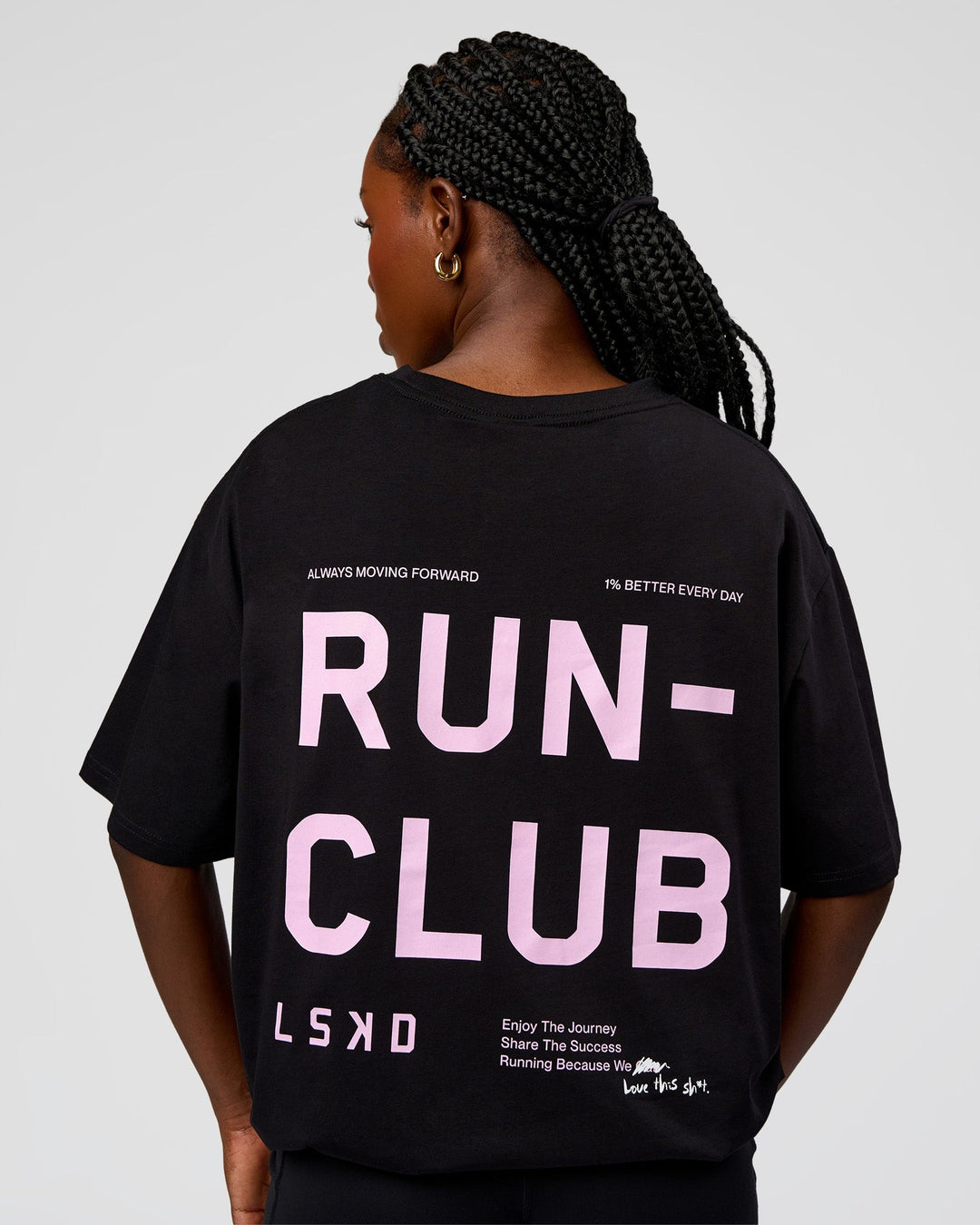 Woman wearing Go-To Run Club FLXCotton Oversized Tee - Black-Marshmallow | Model:Ellie | Size:S - view 1