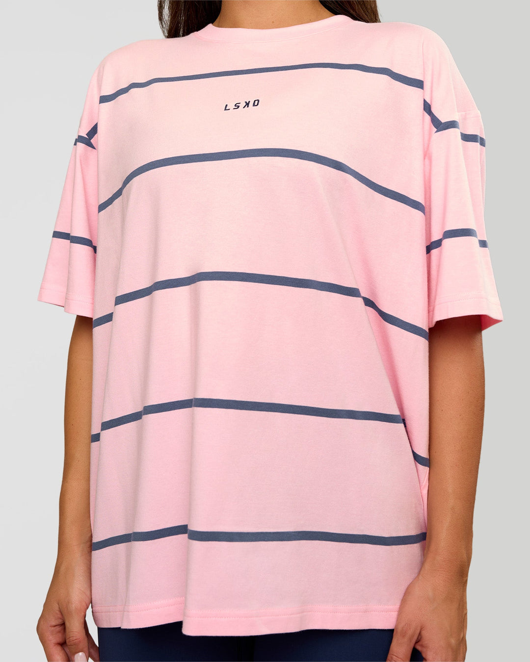 Woman wearing Go-To Stripe FLXCotton Oversized Tee - Marshmallow-Nightshadow | Model:Bianca | Size:S
