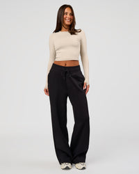 Woman wearing Go-To Wide Leg Track Pant - Black | Model:Bianca | Size:S