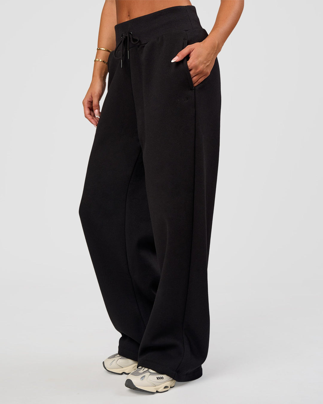 Woman wearing Go-To Wide Leg Track Pant - Black | Model:Bianca | Size:S - view 1