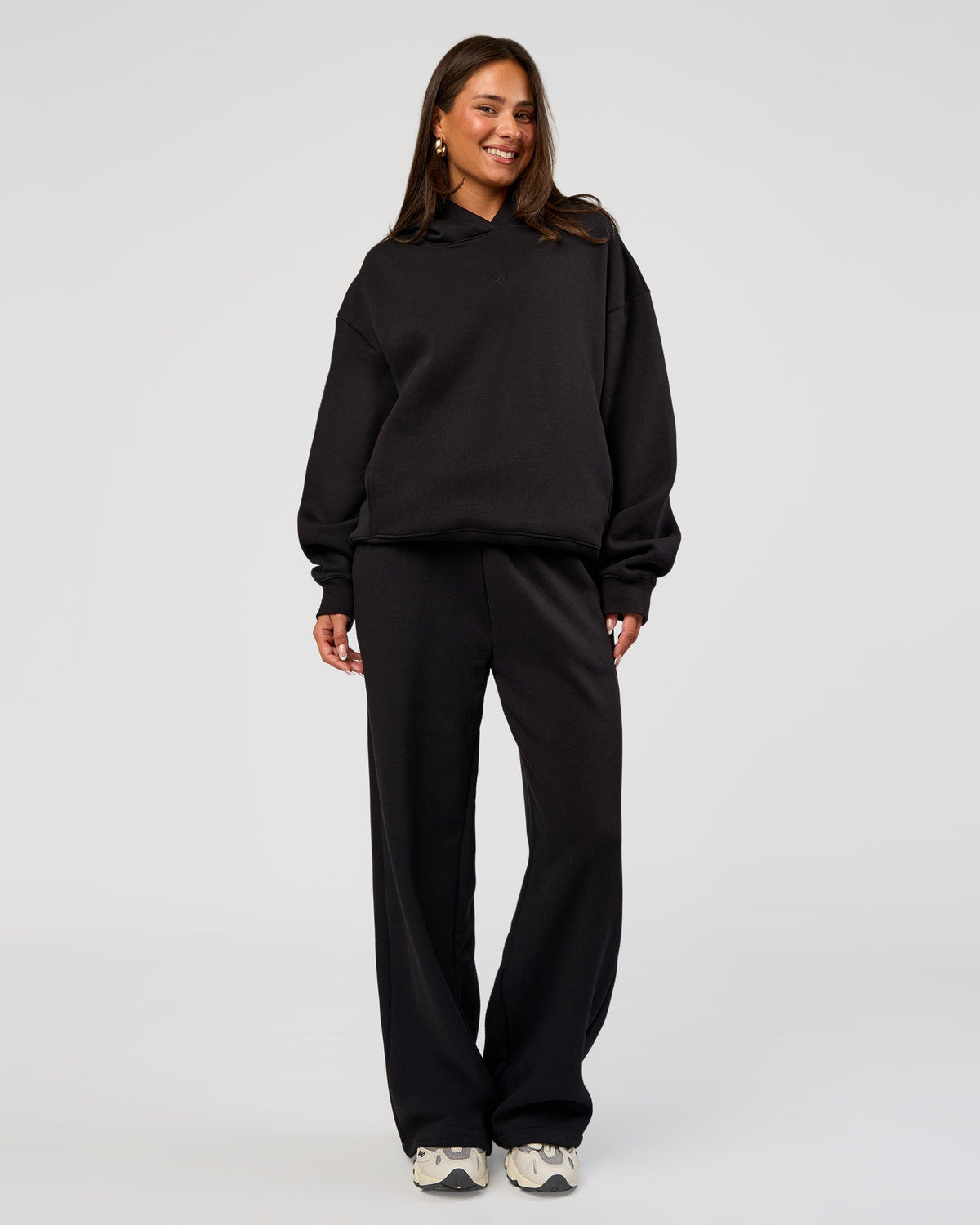 Woman wearing Go-To Wide Leg Track Pant - Black | Model:Bianca | Size:S