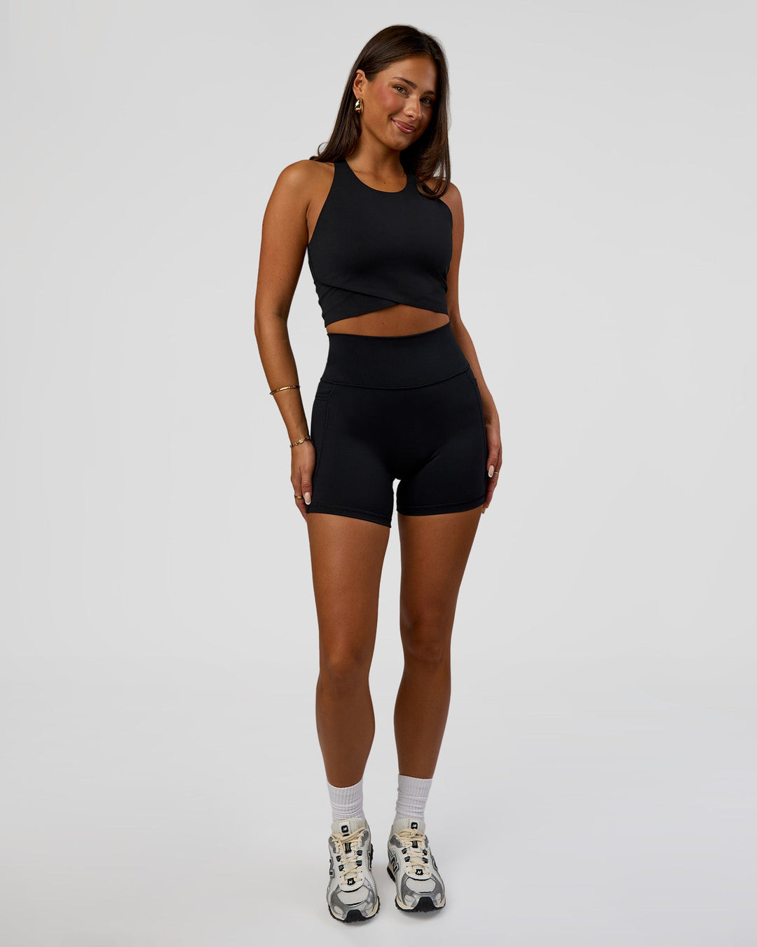 Woman wearing Hybrid Performance Crossover Tank - Black | Model:Bianca | Size:S - view 6