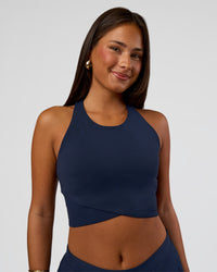 Woman wearing Hybrid Performance Crossover Tank - Future Navy | Model:Bianca | Size:S | Thumbnail Index: 1