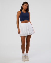 Woman wearing Hybrid Performance Crossover Tank - Future Navy | Model:Bianca | Size:S | Thumbnail Index: 5
