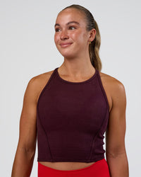 Woman wearing Ignite High Neck Tank - Cherry Lacquer | Model:Sav | Size:S | Thumbnail Index: 2