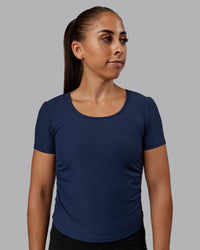 Woman wearing Ignite Ribbed Scrunch Side Cropped Tee - Future Navy | Size:S | Model:Tylah | Thumbnail Index: 1
