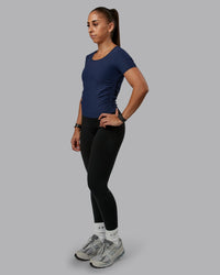 Woman wearing Ignite Ribbed Scrunch Side Cropped Tee - Future Navy | Size:S | Model:Tylah | Thumbnail Index: 0