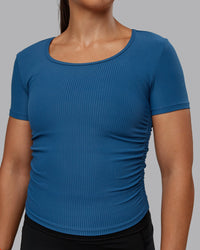 Woman wearing Ignite Ribbed Scrunch Side Cropped Tee - Indigo | Size:S | Model:Tylah | Thumbnail Index: 3