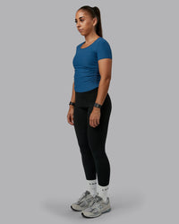 Woman wearing Ignite Ribbed Scrunch Side Cropped Tee - Indigo | Size:S | Model:Tylah | Thumbnail Index: 4