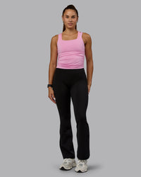 Woman wearing Ignite Scrunch Side Tank - Bubblegum