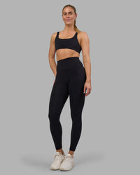Woman wearing Impulse Reversible Sports Bra - Black | Model:Hannah | Size:S | Thumbnail Index: 2