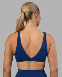 Woman wearing Impulse Reversible Sports Bra - Midnight Blue | Model:Hannah | Size:S | Thumbnail Index: 5