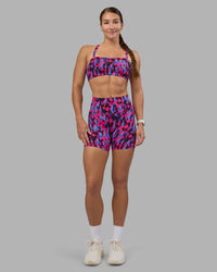 Woman wearing Inspired Sports Bra - Pink Luminous | Model:Hannah | Size:S