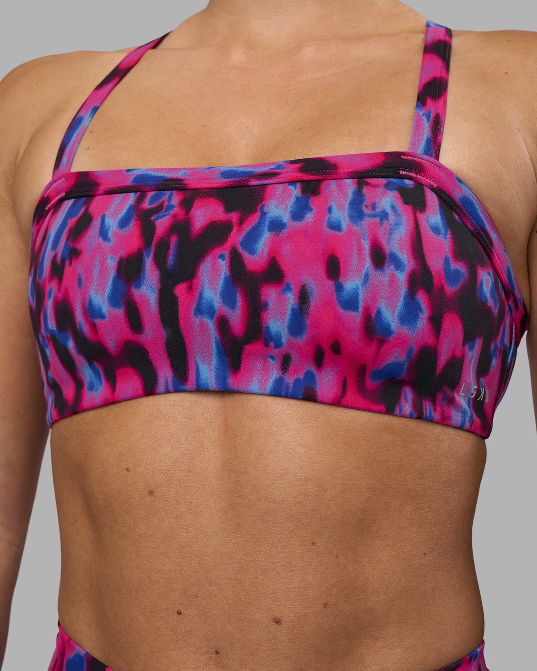 Woman wearing Inspired Sports Bra - Pink Luminous | Model:Hannah | Size:S
