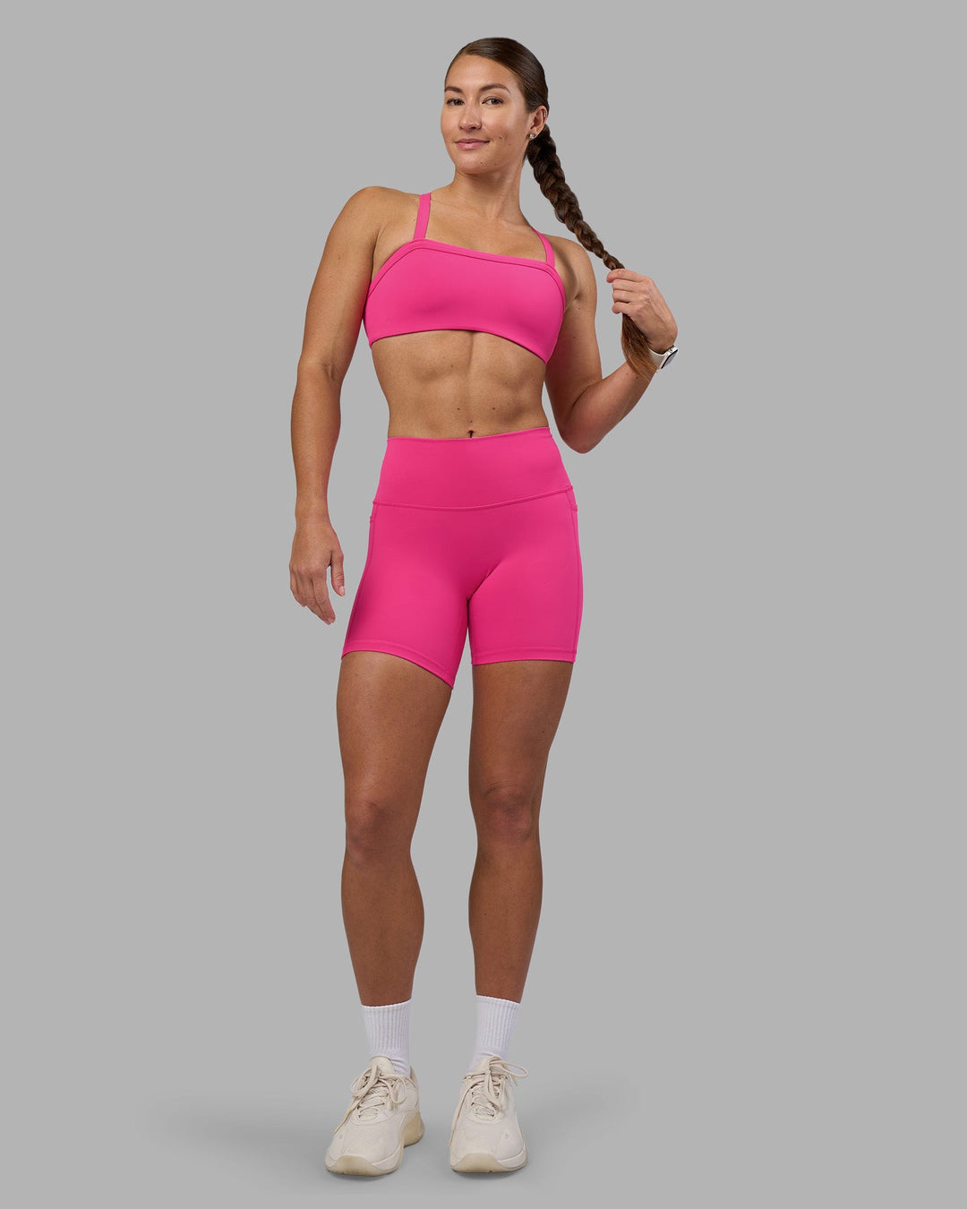 Woman wearing Inspired Sports Bra - Ultra Pink | Model:Hannah | Size:S