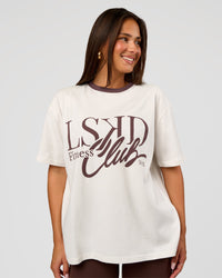 Woman wearing LSKD Fitness Club Heavyweight Oversized Tee - Off White-Cocoa Powder | Model:Bianca | Size:S