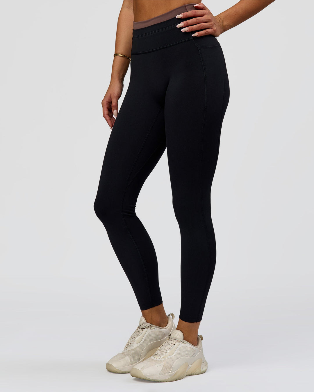 Woman wearing Liberate High-Rise Full Length Legging Pockets in Black-Cocoa Powder | Model:Bianca | Size:S - view 7