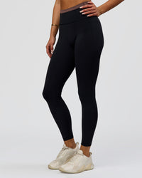 Woman wearing Liberate High-Rise Full Length Legging Pockets in Black-Cocoa Powder | Model:Bianca | Size:S | Thumbnail Index: 6