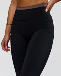 Woman wearing Liberate High-Rise Full Length Legging Pockets in Black-Cocoa Powder | Model:Bianca | Size:S | Thumbnail Index: 3