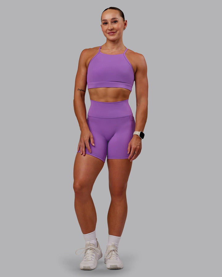 Woman wearing Lift High Neck Sports Bra - Purple Fizz
