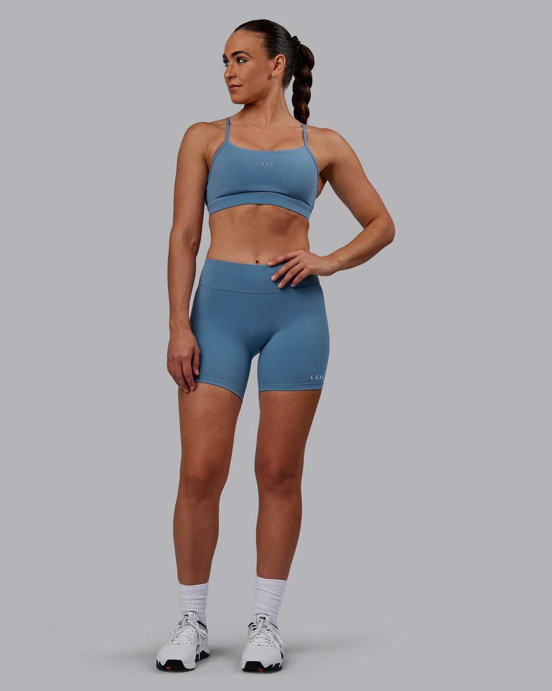 Woman wearing Lift Sports Bra - Elemental Blue