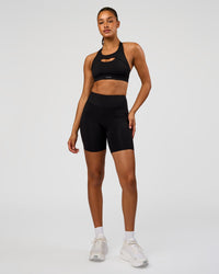 Woman wearing LimitLift Sports Bra - Black | Model:Rosie | Size:S | Thumbnail Index: 3