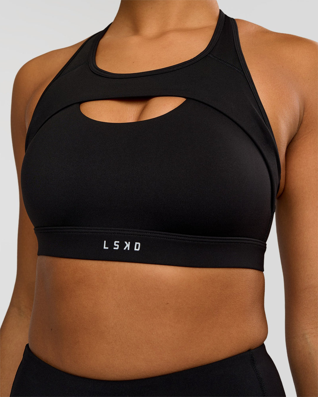 Woman wearing LimitLift Sports Bra - Black | Model:Rosie | Size:S - view 1
