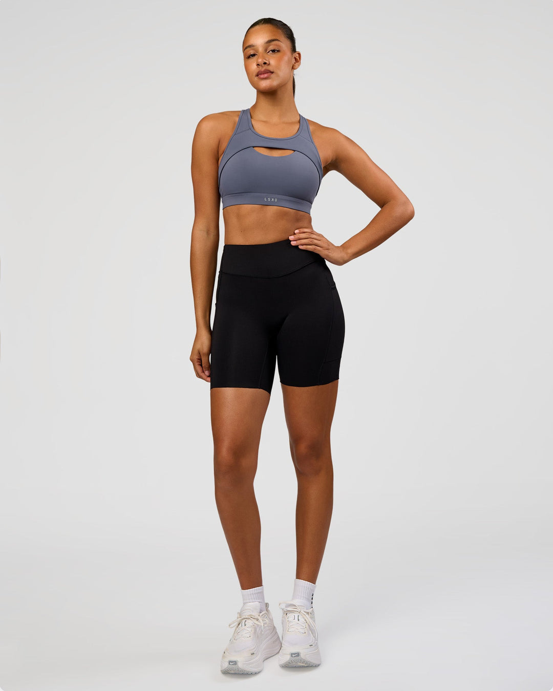 Woman wearing LimitLift Sports Bra - Night Shadow | Model:Rosie | Size:S - view 4