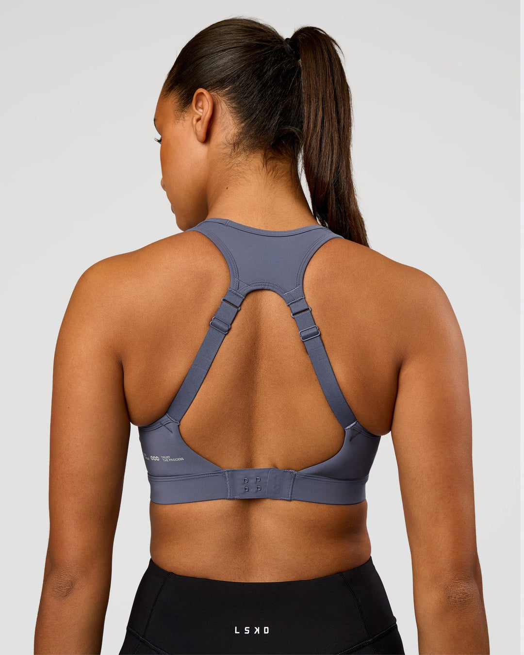 Woman wearing LimitLift Sports Bra - Night Shadow | Model:Rosie | Size:S - view 3