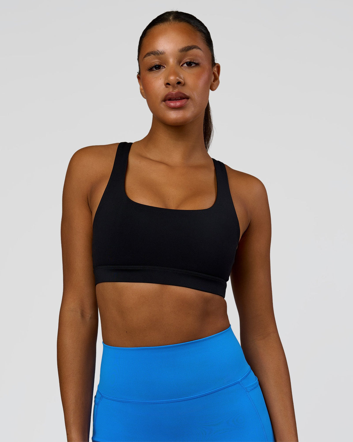 Model wearing Limitless Sports Bra - Black | Model:Rosie | Size:S - view 1