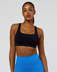Model wearing Limitless Sports Bra - Black | Model:Rosie | Size:S | Thumbnail Index: 0