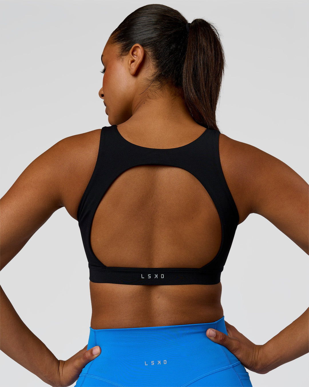Model wearing Limitless Sports Bra - Black | Model:Rosie | Size:S - view 2