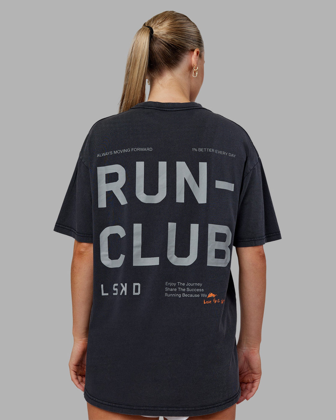 Woman wearing Love The Run FLXCotton Tee Oversize - Black Washed-Circular Grey | Model:Neve | Size:S