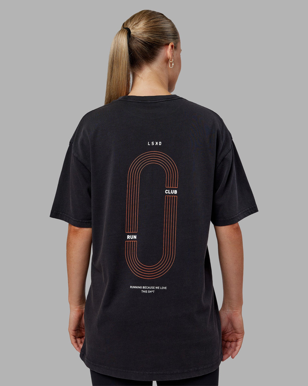 Woman wearing Love this S**t Washed Heavyweight Oversized Tee - Washed Black-Ultra Orange | Model:Neve | Size:S