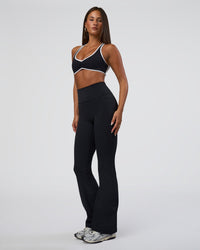 Woman wearing Luminous Sports Bra - Black-White | Model:Bianca | Size:S