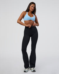 Woman wearing Luminous Sports Bra - Open Air-White | Model:Bianca | Size:S