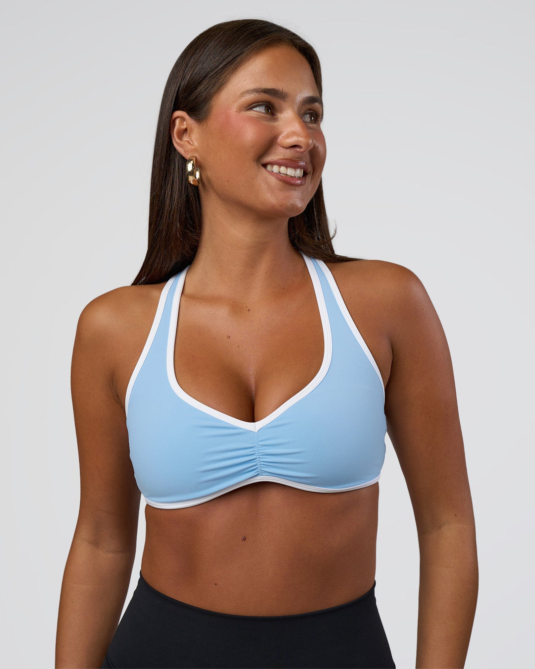 Woman wearing Luminous Sports Bra - Open Air-White | Model:Bianca | Size:S
