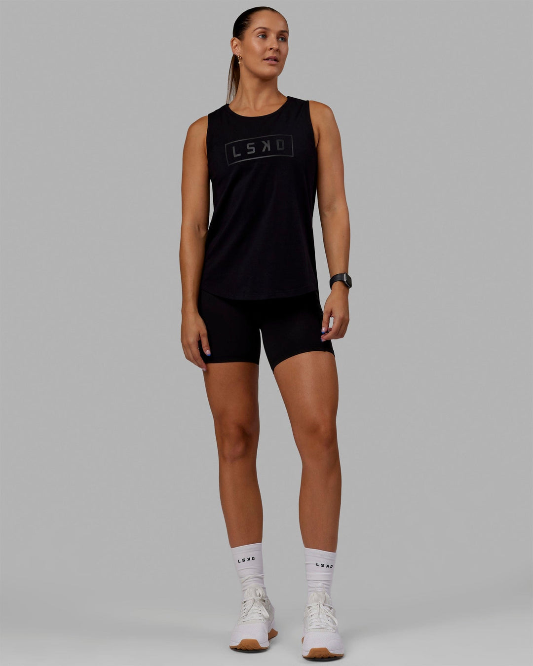 Woman wearing Luna FLXCotton Longline Tank - Black-Black