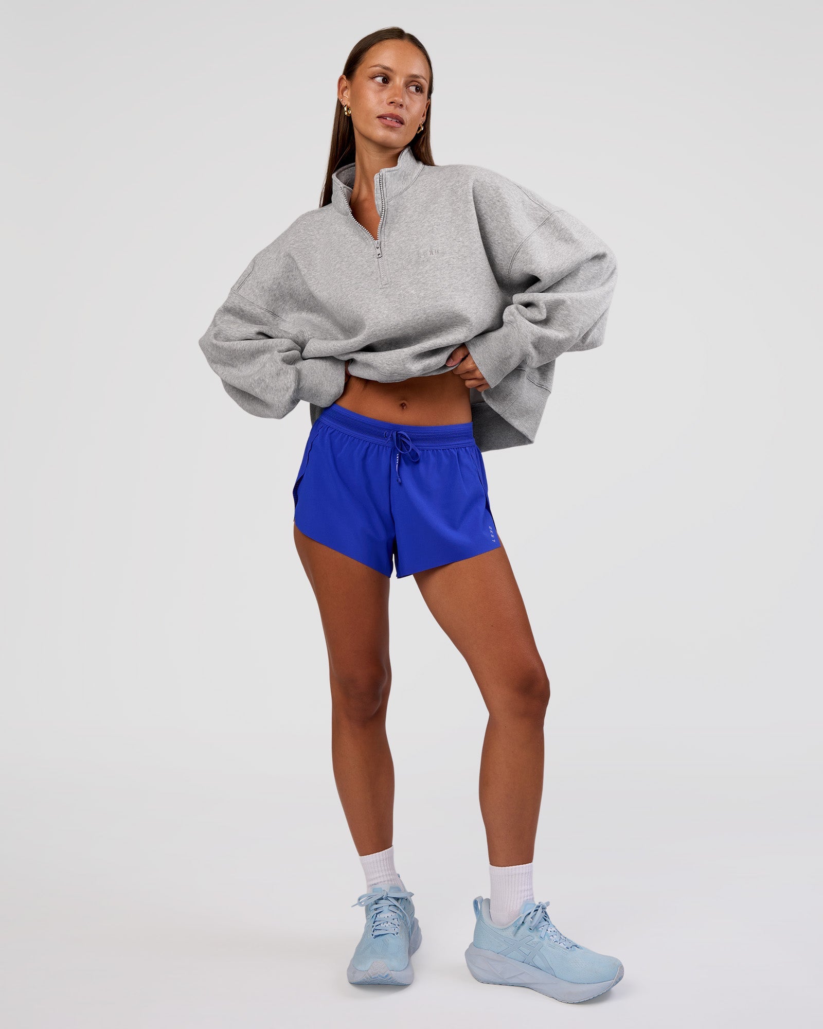 Woman wearing MVP 1/2 Zip Oversized Sweater - Light Grey Marl | Model:Brylee | Size:S