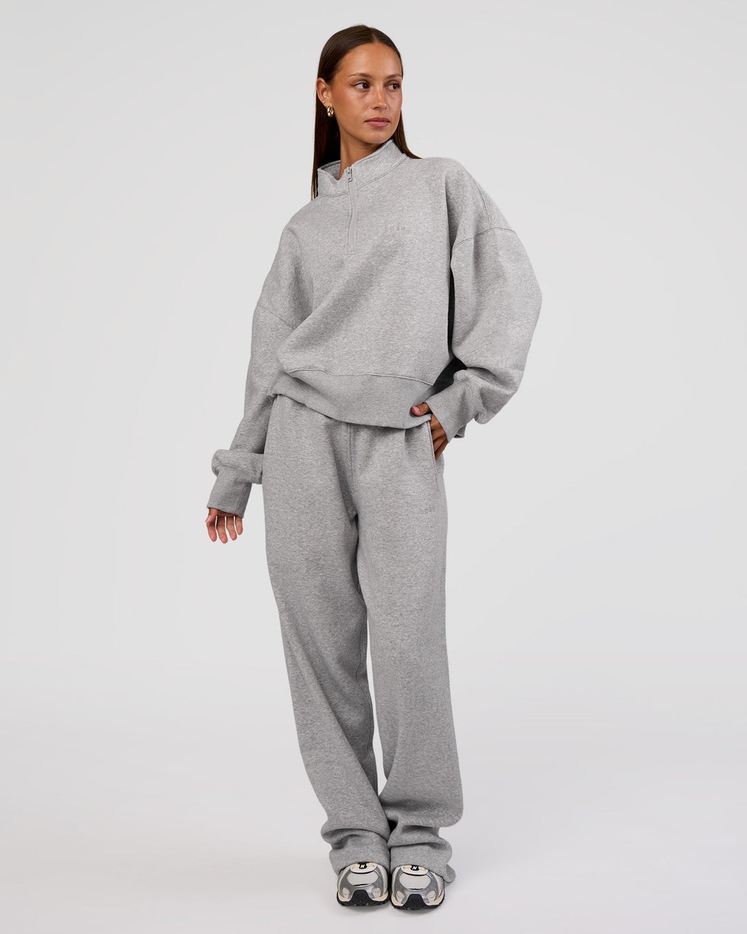 Woman wearing MVP 1/2 Zip Oversized Sweater - Light Grey Marl | Model:Brylee | Size:S