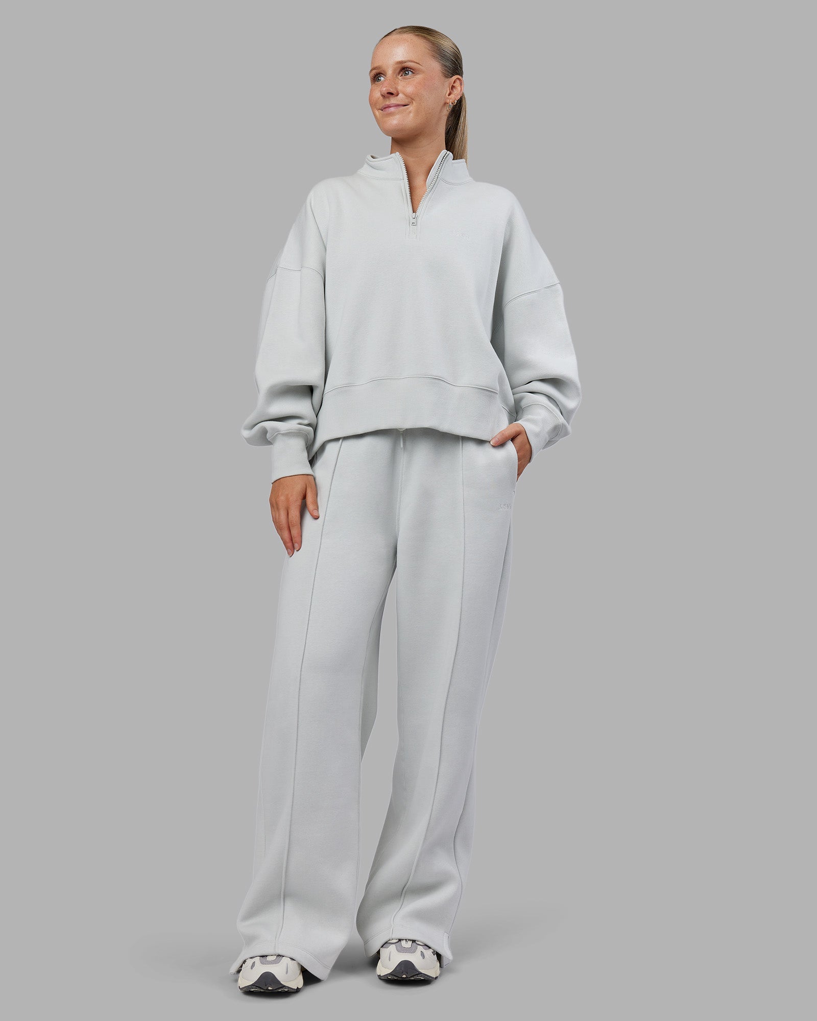 Woman wearing MVP 1/2 Zip Oversized Sweater - Digital Mist | Model:Neve | Size:S