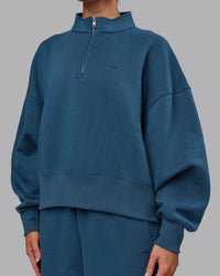 Woman wearing MVP 1/2 Zip Oversized Sweater - Indigo | Model:Paris | Size:S | Thumbnail Index: 2