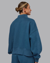 Woman wearing MVP 1/2 Zip Oversized Sweater - Indigo | Model:Paris | Size:S | Thumbnail Index: 3