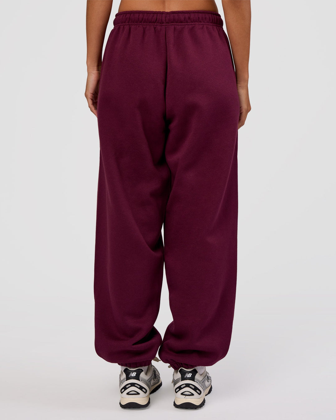 Woman wearing MVP Oversized Slouchy Fit Track Pant - Cherry Lacquer | Model:Brylee | Size:S