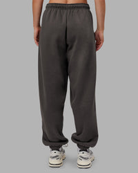 Woman wearing MVP Oversized Slouchy Fit Track Pant - Dark Storm | Model:Neve | Size:S | Thumbnail Index: 3